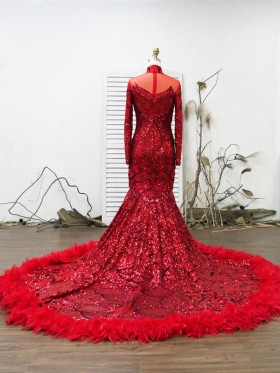 red sequin floor length prom dress with feathers