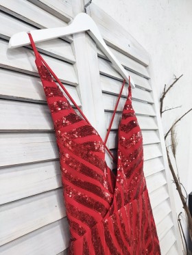 red sequin plunging neckline open back prom dress with spaghetti straps