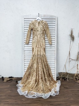 gold sequin prom dress with flounced hemline