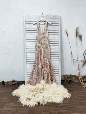 gold patterned sequin and feather long train prom dress