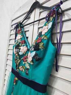 colored 3D flowers adorned teal dress colored 3D flowers adorned teal dress