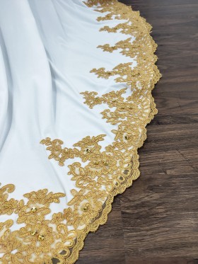 gold lace appliqued white jersey dress