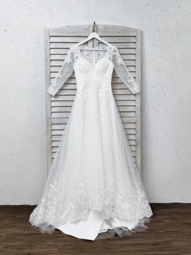 ivory lace and tulle A line wedding dress with long sleeves