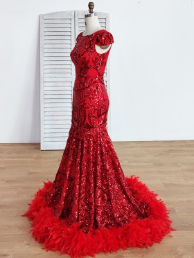 red sequin prom dress with feather train