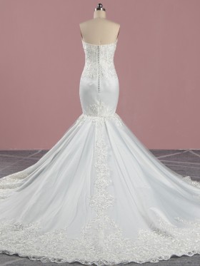 lace and tulle overlaid chapel train wedding dress