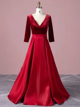 red velvet and satin formal gown with three quarter sleeves