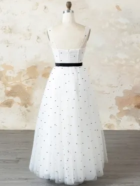 black polka dotted white long dress