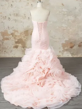 blush wedding gown with lace up back and cascading train