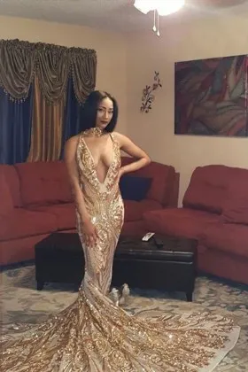 Sparkly gold sequin plunging neckline mermaid long train prom gown