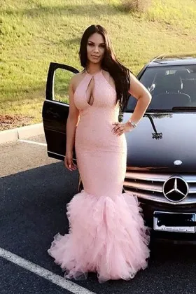 Glistening baby pink satin and ruffled trumpet tulle thigh prom gown