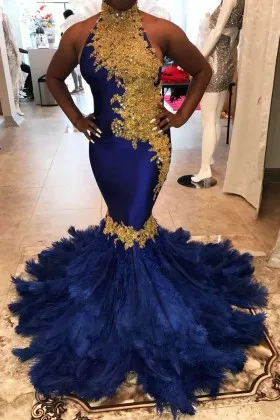 Beaded gold lace appliqued royal blue unique feather trumpet prom gown