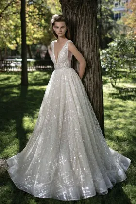 Sparkly ivory glitter plunging neckline flounced floor length pageant gown