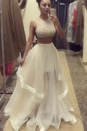 Ivory glitter and flounced tulle two piece sleeveless designer prom gown
