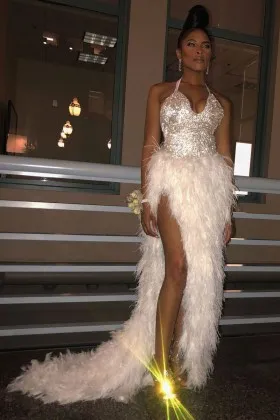 Sparkly crystals with ivory feather high split halter open back prom dress