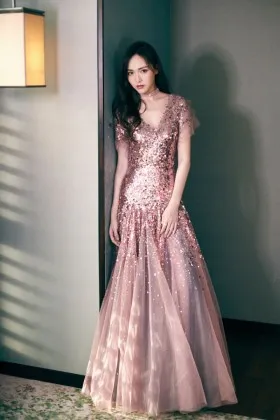 Bedazzled mauve sequinned tulle dropped waist fit and flare formal dress