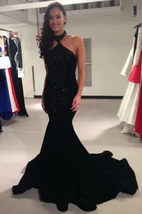 Uniquely beaded black halter mermaid long prom dress with flounced long train