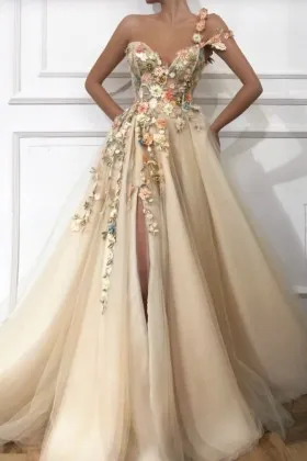 Nude brown tulle high slit evening gown with handmade flowers appliqued