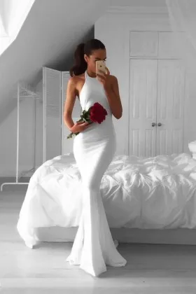 body hugging white mermaid open back halter neckline long prom dress