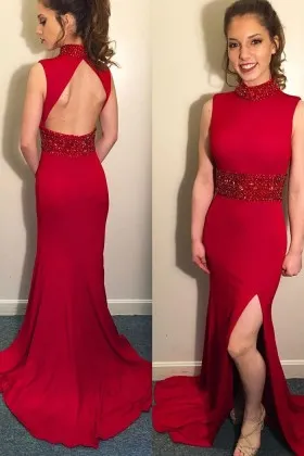 Beaded red high neckline open back thigh high slit long prom dress