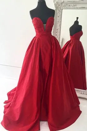 Pleated strapless plunging bodice red satin overskirt low back prom dress