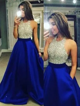Dramatic silver beading bodice with royal blue satin puffy long prom dress