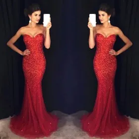 heavily hand made red beading strapless prom dress