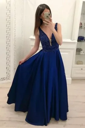 navy blue satin plunging neck beaded formal dress
