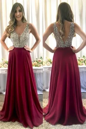 beaded plunging neck burgundy A line long prom gown