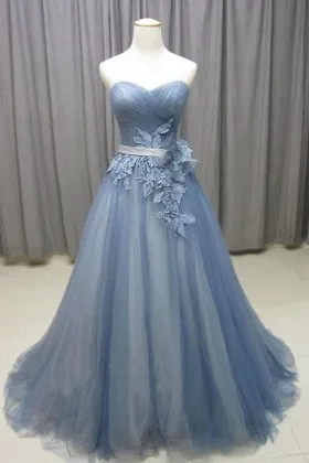 dusty blue lace appliqued tulle strapless prom gown