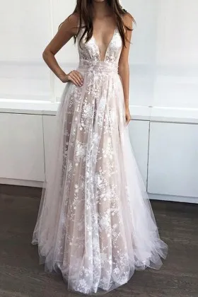 white lace appliqued nude prom dress with white tulle overlay
