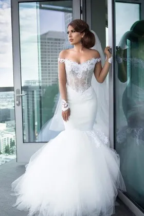Modern illusion off the shoulder long sleeve lace and tulle trumpet wedding gown