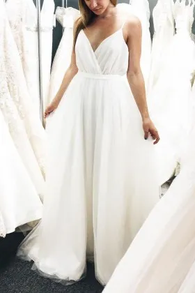 Simply white V neck spaghetti straps empire waist A line long wedding dress