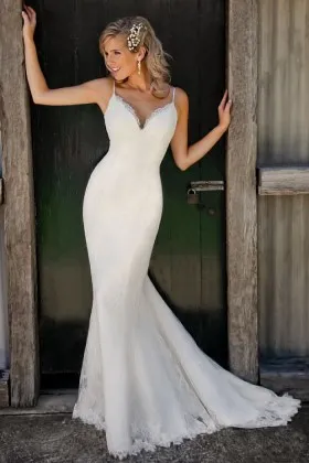 Modern ivory lace mermaid destination wedding dress with spaghetti straps