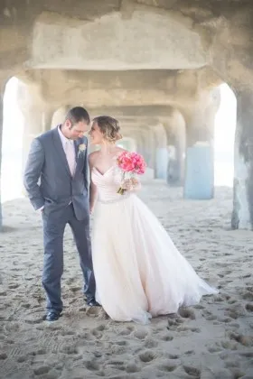 Blush satin and tulle strapless floor length romantic destination wedding dress