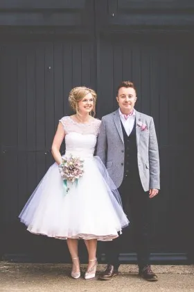 1950s inspired vintage polka dot tulle overlaid tea length bridal gown