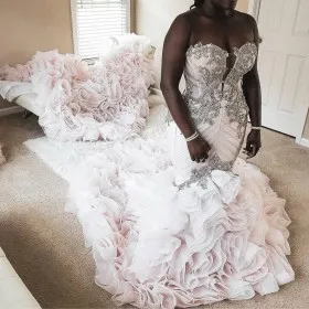Luxury beaded light pink tulle trumpet wedding dress with cascading ruffled organza royal train skirt