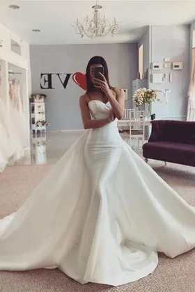 body hugging ivory satin overskirt wedding dress