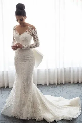 Ivory lace mermaid demure wedding dress with illusion off the shoulder neckline and long sleeves