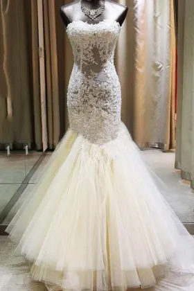 cream lace strapless sweetheart trumpet bridal gown