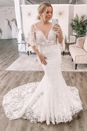 V neckline flutter sleeve white lace wedding dress