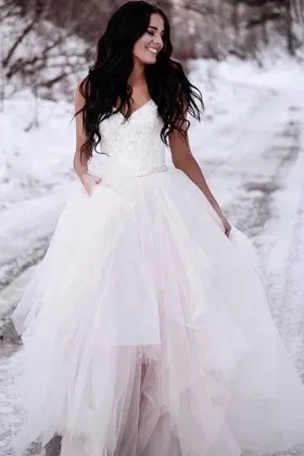 Romantic blushing pink white tulle wedding gown