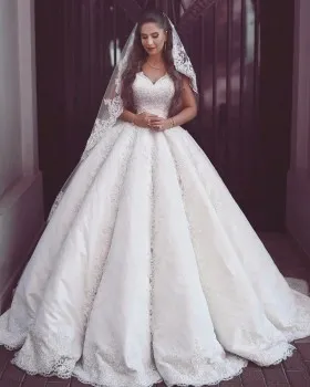Princess satin wedding gown with lace overlay