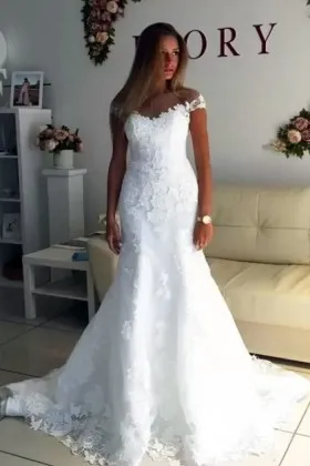 white lace off the shoulder cap sleeve wedding gown