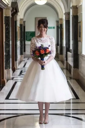 lace satin and tulle tea length puffy wedding gown