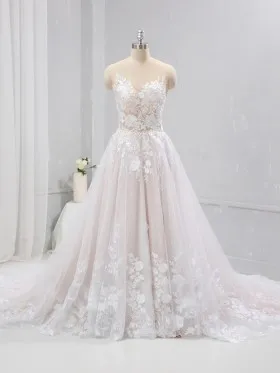 Beautiful blush wedding dress with white lace overlay