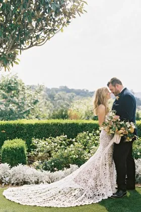 hollow chemical lace wedding gown with chapel train