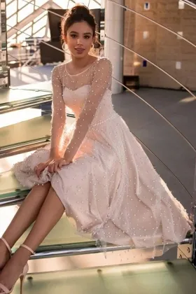 pink pearled tulle long sleeves tea length bridal dress