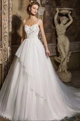 Beaded lace appliqued satin and organza ball gown wedding dress with chapel train