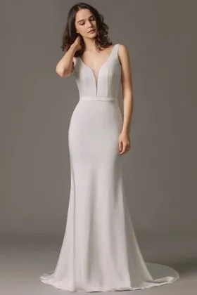 Simple feminine fit and flare floor length satin wedding gown
