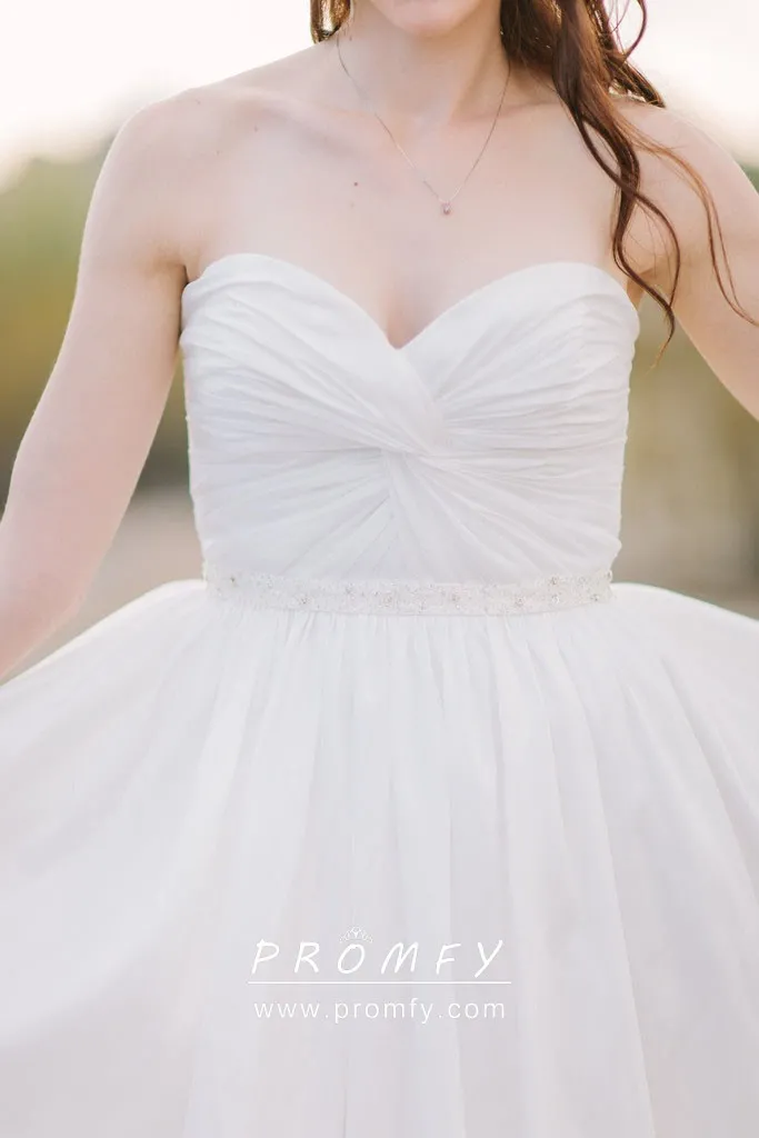 white sweetheart wedding dress